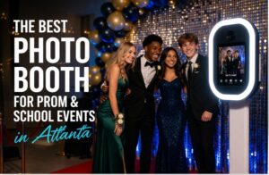 Group of four high school students posing at a modern open-air photo booth during prom, dressed in formal attire with festive props, in front of a sparkling sequin backdrop and balloon arch in Atlanta.